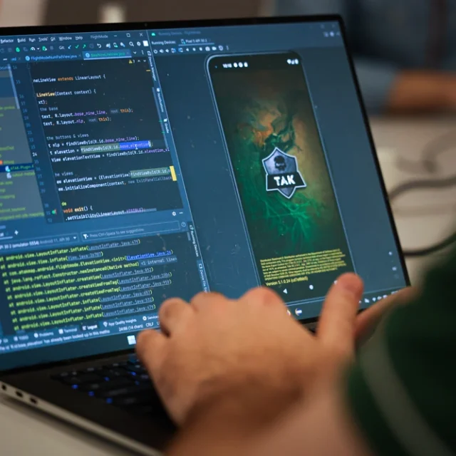 U.S. Marine Corps Capt. David Whalen, assigned to the Marine Innovation Unit (MIU), Marine Forces Reserve, works on developing a “Flight Mode” software feature at the Marine Corps Software Factory (MCSWF) in Austin, Texas, 17 - 29 March, 2025.