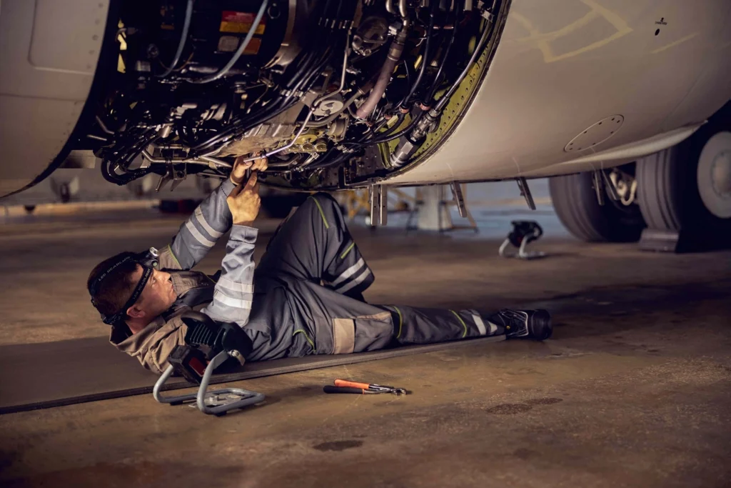 An engine being worked on in an MRO facility