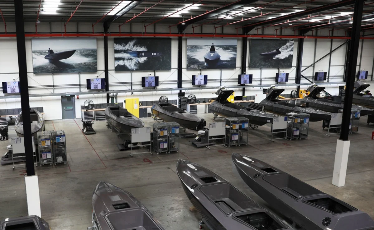 Kraken Technology's workshop showing rows of drone boats
