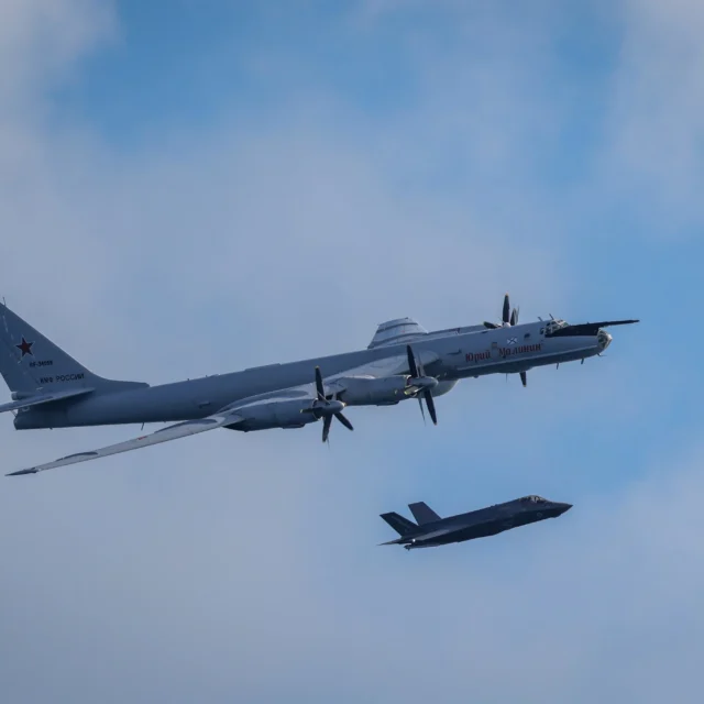 Russian Tu-142 maritime patrol aircraft and British F-35B