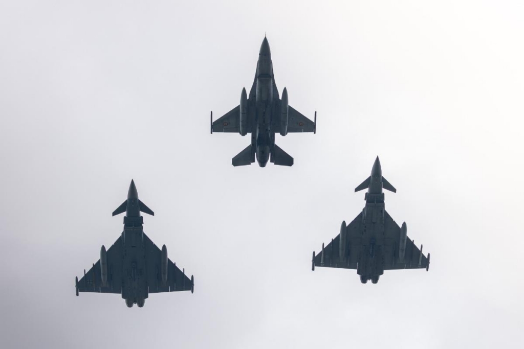 UK Royal Air Force Eurofighter Typhoons fly in formation in Romania. During the deployment, Royal Air Force Eurofighter Typhoon aircraft and personnel from 121 Expeditionary Air Wing maintained continuous Quick Reaction Alert (QRA) on NATO's Eastern Flank.