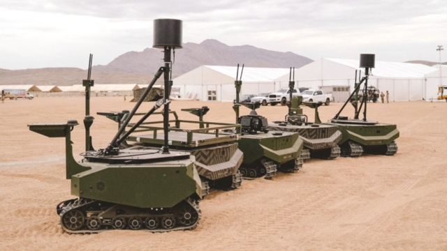 Five of the eight ARX Robotics-made GEREON UGVs are seen on the ground at Fort Irwin, California, during the PC-C6 trial that was held in July 2026. Note that each of these UGVs is configured for a different mission set. Image: ARX Robotics