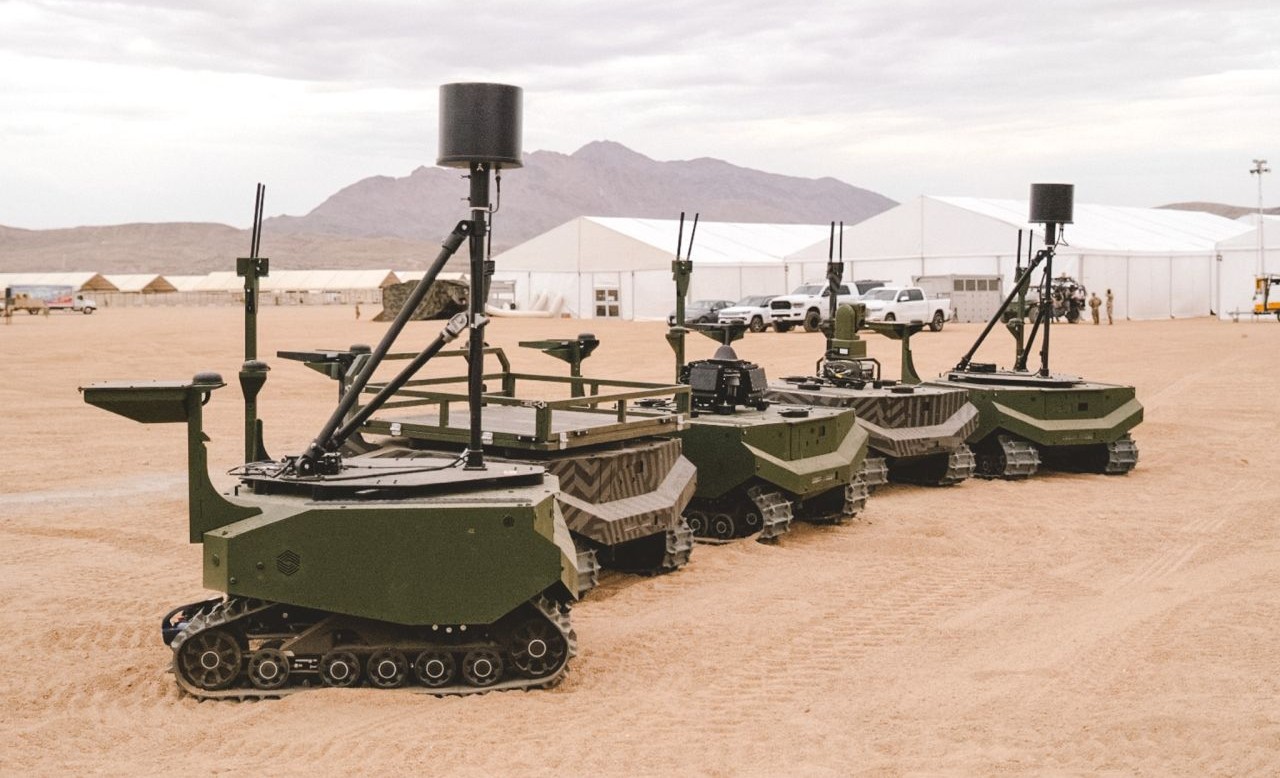 Five of the eight ARX Robotics-made GEREON UGVs are seen on the ground at Fort Irwin, California, during the PC-C6 trial that was held in July 2026. Note that each of these UGVs is configured for a different mission set. Image: ARX Robotics