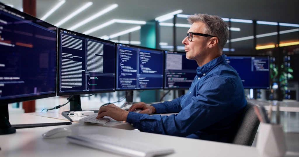 Cyber security being done by a man on a computer