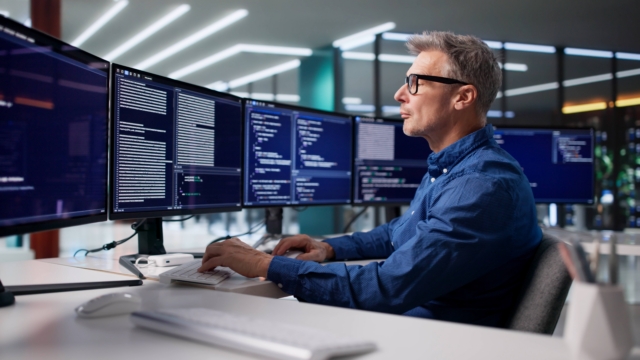 Cyber security being done by a man on a computer