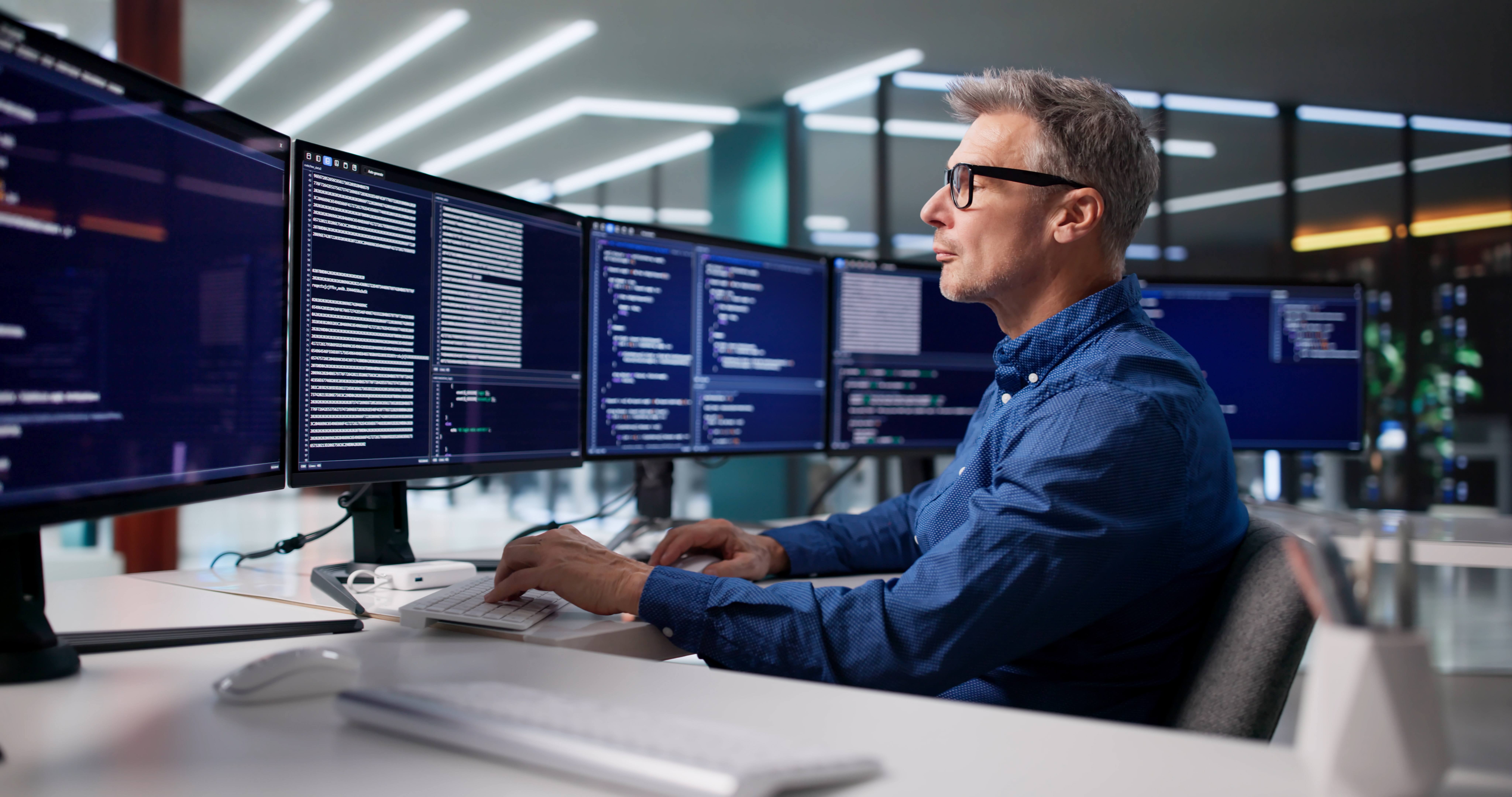 Cyber security being done by a man on a computer