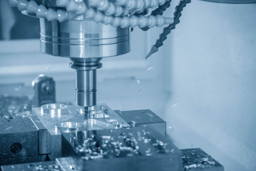 The CNC milling machine cutting the mold parts with solid ball endmill tool. The injection mold manufacturing process by CNC machining center.