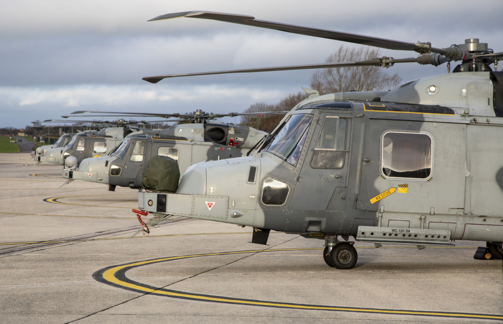Four British Army Wildcat AH1s are seen on the flightline at RNAS Yeovilton, Somerset, before departing for a deployment to Lithuania in October 2022. Image: MOD Crown Copyright/SAC Laura Wing