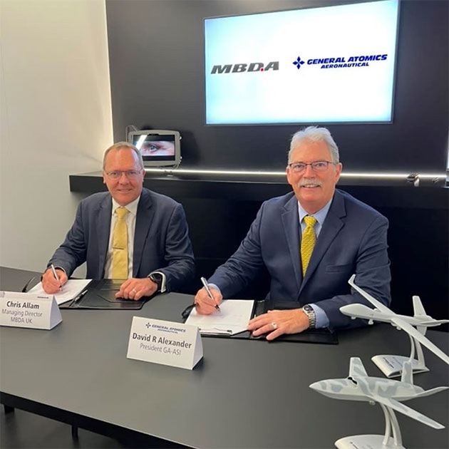 David R Alexander, President of GA-ASI (right), and Chris Allam, managing director of MBDA UK (left), sign the MOU to integrate SPEAR missiles onto the MQ-9B and Gambit 6 platforms during the Farnborough International Airshow on 21 July 2026. Image: GA-ASI