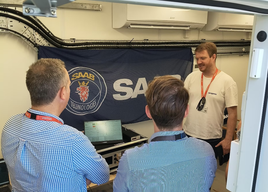 Jonathan Woods, Head of Engineering at Aquark, briefing partners at Saab and the Royal Navy ahead of the trial.
