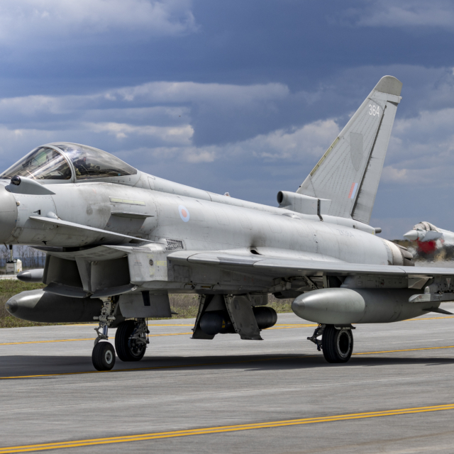A Typhoon FGR4 (serial ZK364) from the RAF's No 3(F) Squadron taxis to the runway at the 86th Air Base in Borcea, Romania, before launching for a 'Tango' QRA training scramble on 7 April 2026. Image: MOD Crown Copyright/AS1 Ben Webb