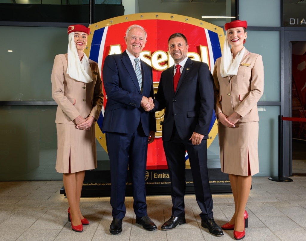 Sir Tim Clark and Richard Garlick with the aircrafted arsenal crest