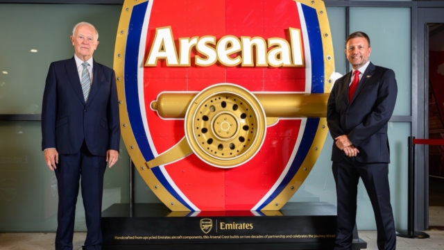 Sir Tim Clark and Richard Garlick with the aircrafted arsenal crest