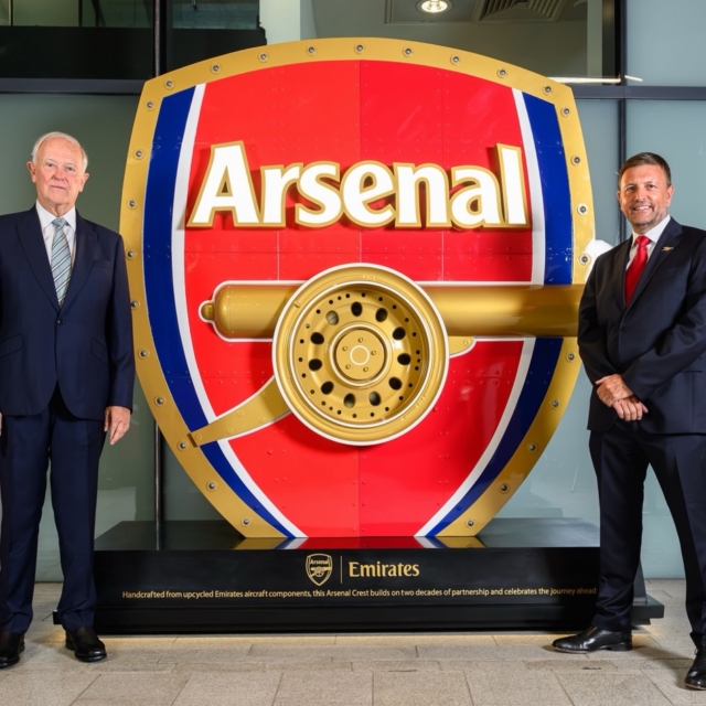 Sir Tim Clark and Richard Garlick with the aircrafted arsenal crest