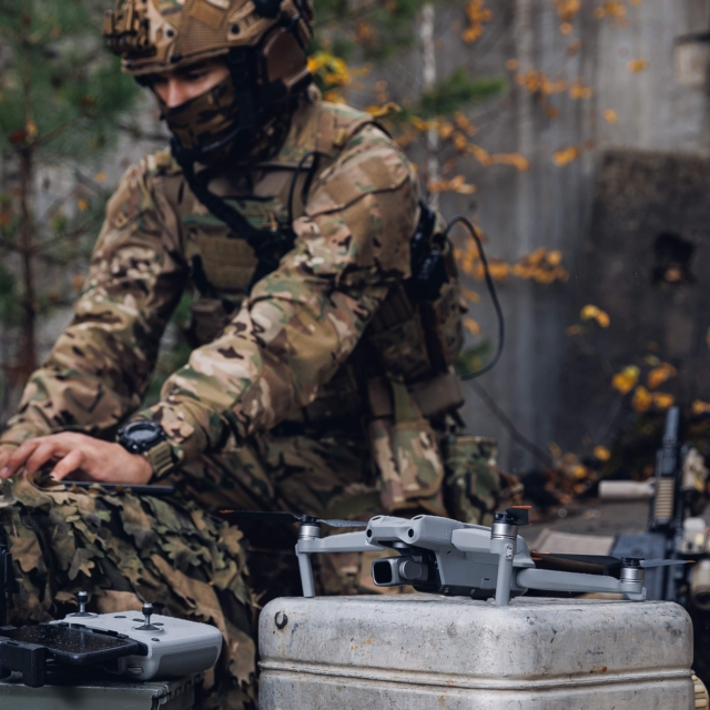 Ukraine soldier sets up a drone to use on the battlefield