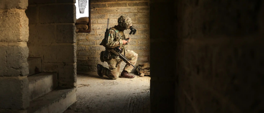 British Army soldier controlling drone