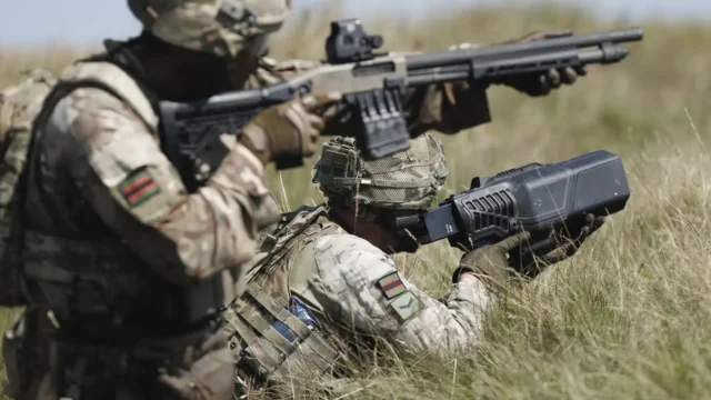 Riflemen shooting down drones