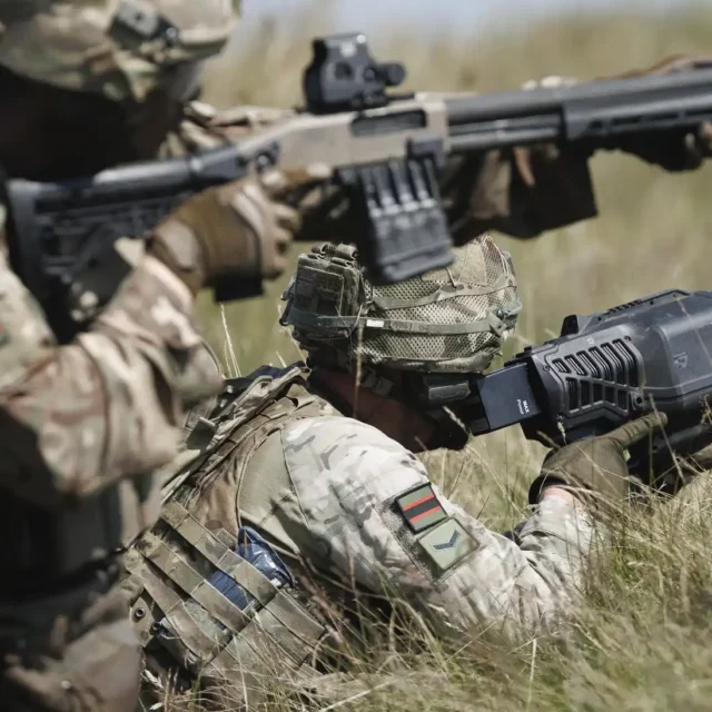 Riflemen shooting down drones