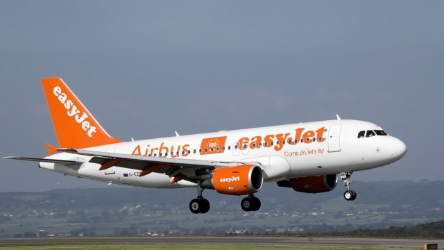EasyJet Airbus A319-100 (G-EZBR), the hundredth Airbus to be delivered to EasyJet, lands at Bristol International Airport, England, with special livery.