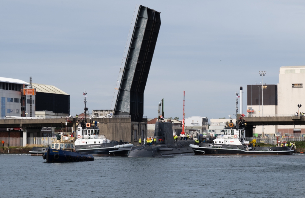 HMS Agamemnon passing under the lifting bridge