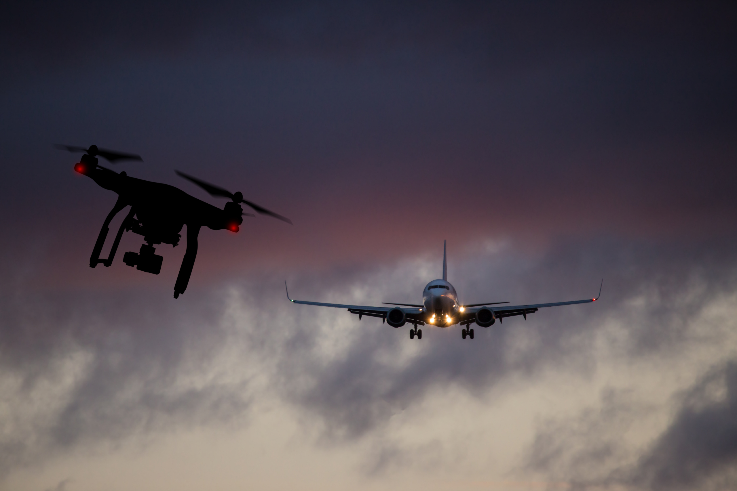 Drone flying near commercial airplane