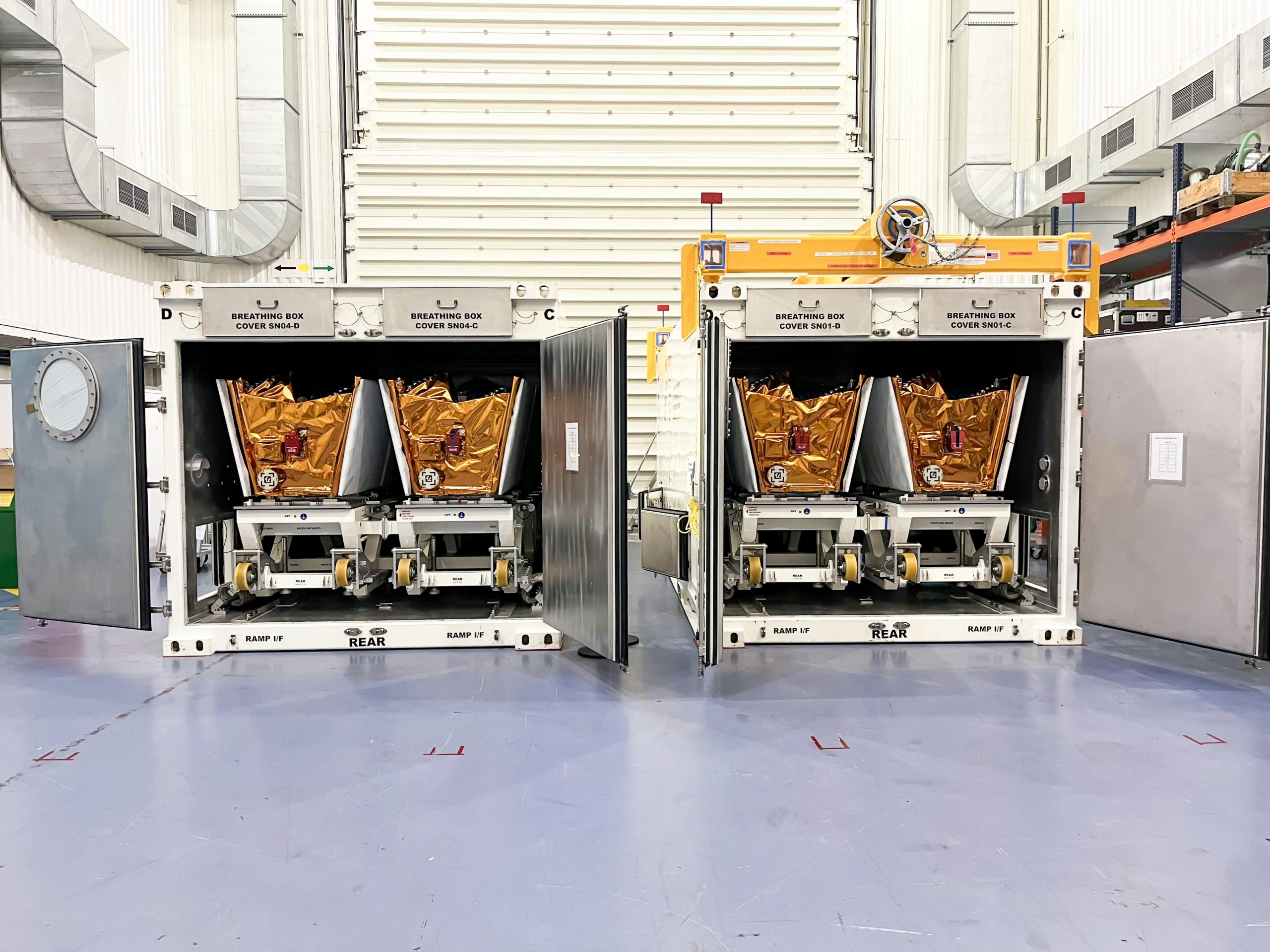 OneWeb satellites in transport container at Airbus