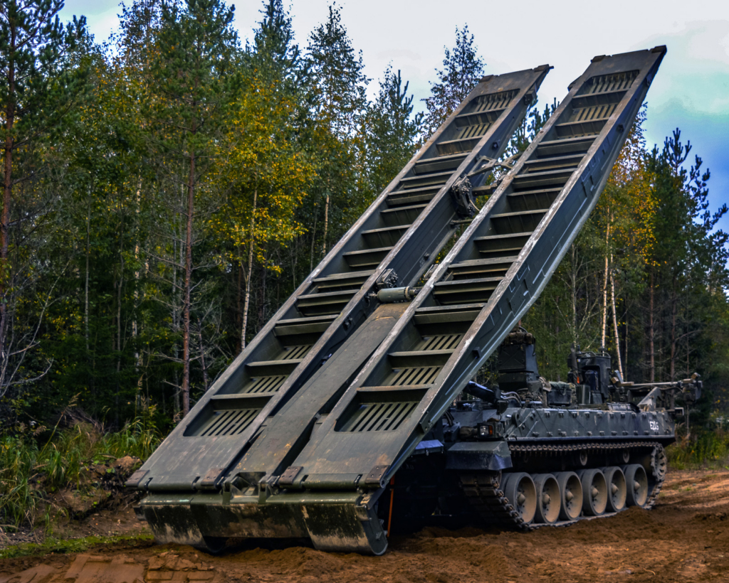 A British Army-operated TITAN Armoured Vehicle Launching Bridge takes part in Operation Cabrit in Estonia on 30 September 2020. Capabilities like this would likely have been demonstrated and discussed during MES 26. Image: MOD Crown Copyright/Sgt Dobson