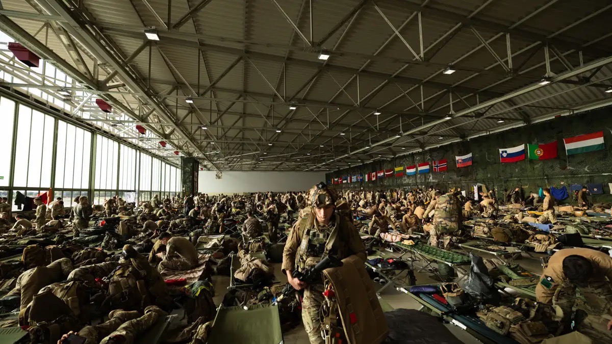 Image: French and British Paratroopers administrating themselves in a hanger at Celle Airfield ready to jump from RAF A400’s as part of Exercise RHINO TITAN.
Over seven weeks (Sep-Oct 2026) of demanding training at Sennelager in Germany, Exercise RHINO TITAN has tested 16 Air Assault Brigade’s readiness to serve as the UK military’s global response force.